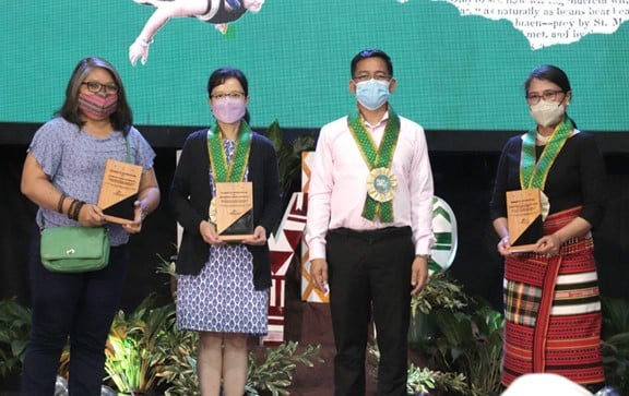 Dr. Ambrosio B. Cultura II, USTP System President, awards plaques of recognition
