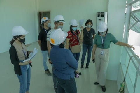 PMEs inspecting an area of one of the office spaces of the new FIC Building