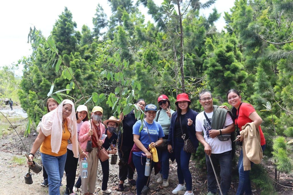 USTP Panaon Faculty and Staff at Tree Planting Site