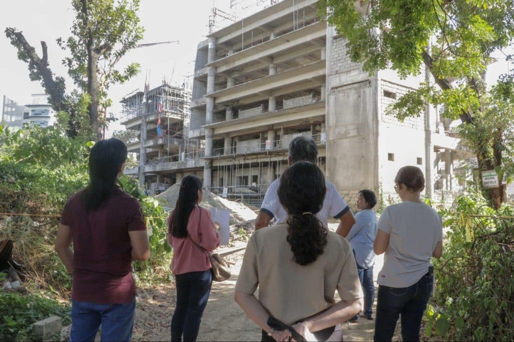 Inspecting the under-construction Student Center and Education Complex from a safe distance| Photo by Khairon Cañete 2