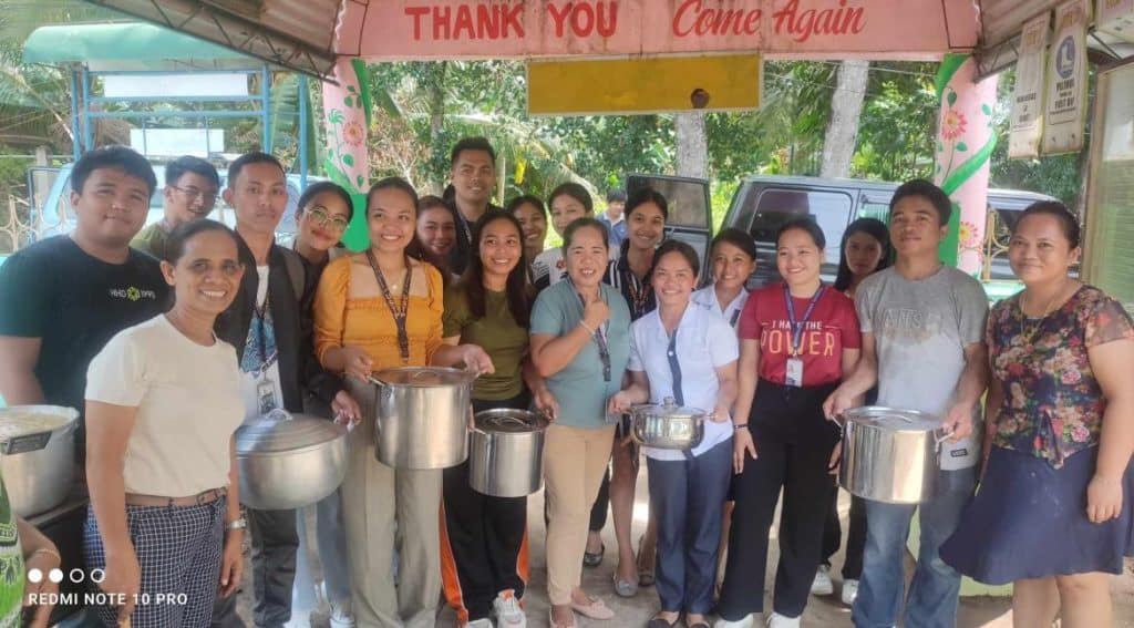 USTP Panaon NSTP students provide meal service to PES 1